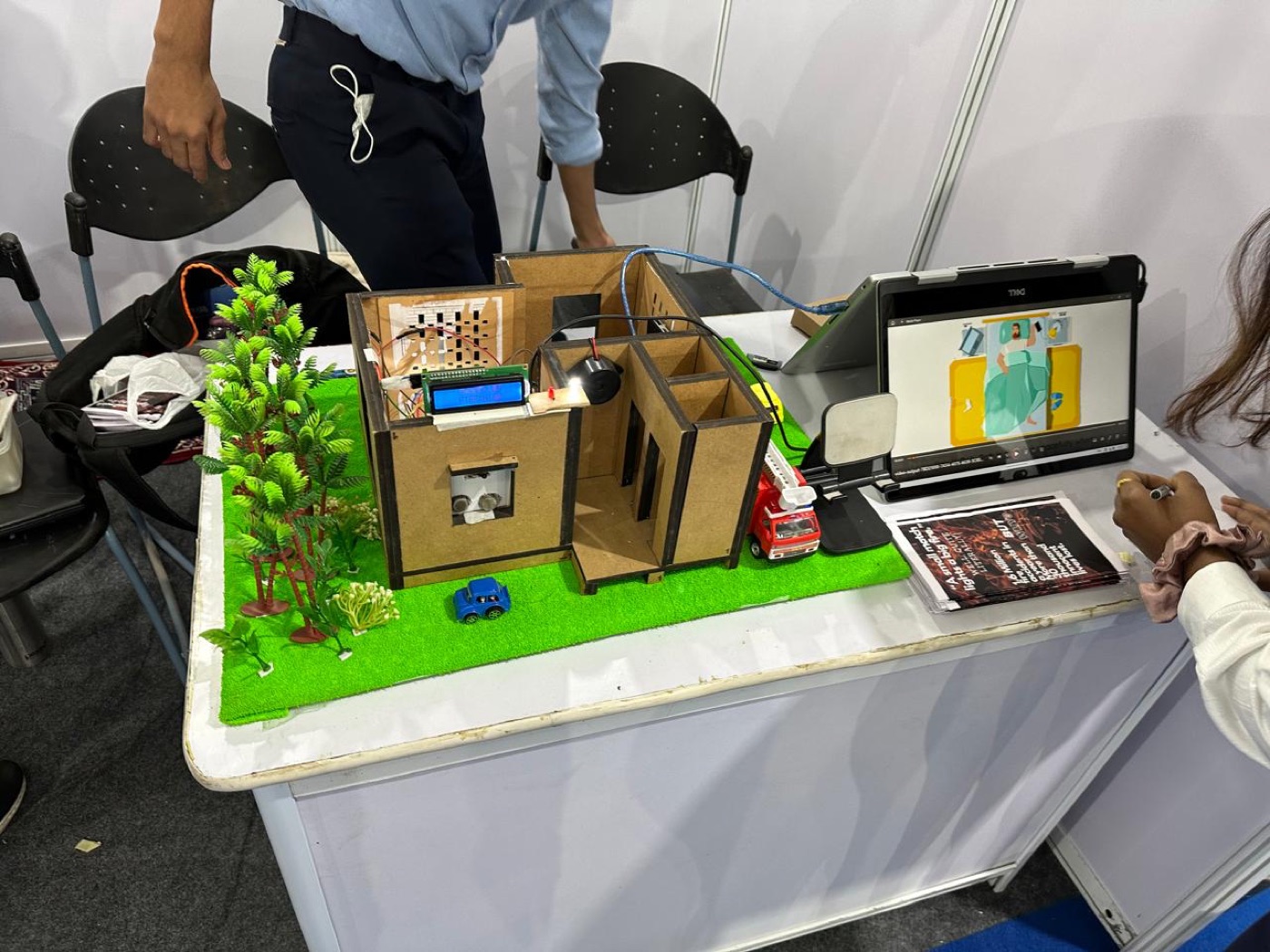 SafeSense scale model home with sensor zones